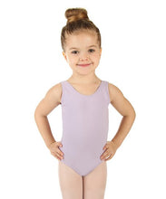 Load image into Gallery viewer, A young girl smiling, wearing a simple lavender tank-style leotard, standing with hands on her hips against a white background.