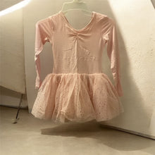 Load image into Gallery viewer, Ek light pink rang ki long-sleeve ballet dress jismein star-patterned sparkly tulle tutu skirt attached hai, jo hanger par latki hui hai.