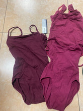 Load image into Gallery viewer, Ek halki farsh par rakhi hui gehre maroon aur thodi halki berry (rose pink) rang ki spaghetti strap wali dance leotards ka sangrah.