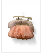 Load image into Gallery viewer, A set featuring a multi-layered layered peach-pink tutu skirt and a white polka-dot top on a single hanger.