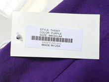 Load image into Gallery viewer, Close-up of a product tag for a purple dance leotard, style number TH5501, size medium, made in USA.