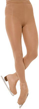 Load image into Gallery viewer, A close-up view of a person wearing tan-colored opaque dance tights paired with tan lace-up skating boots, set against a white background.